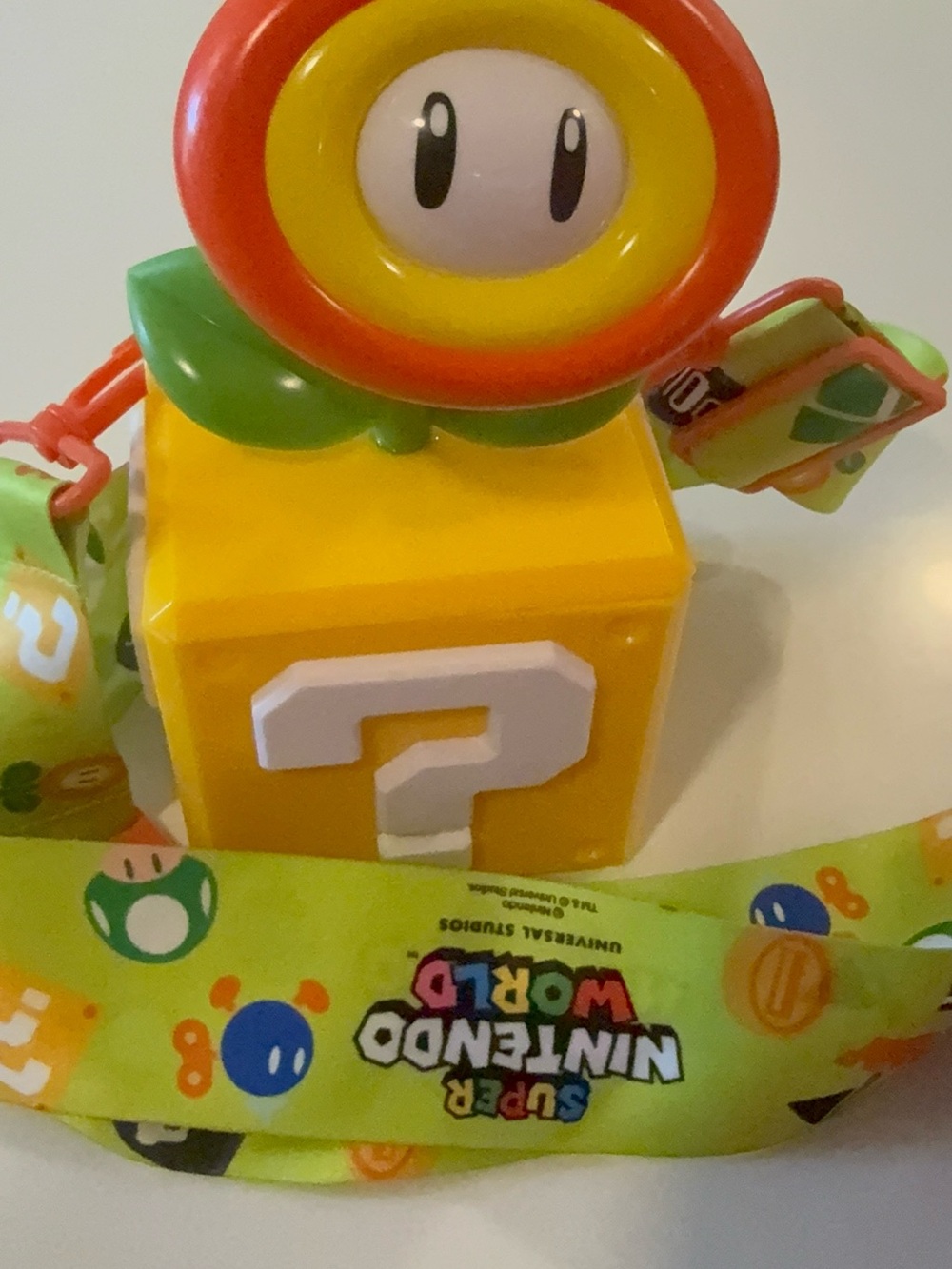 Nintendo Yellow Question Block Keychain with Green Lanyard and Red Flower Topper